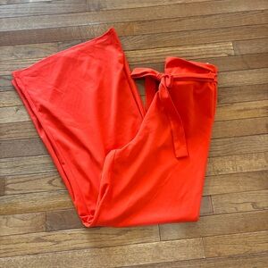 Women’s orange wide leg slacks size M.